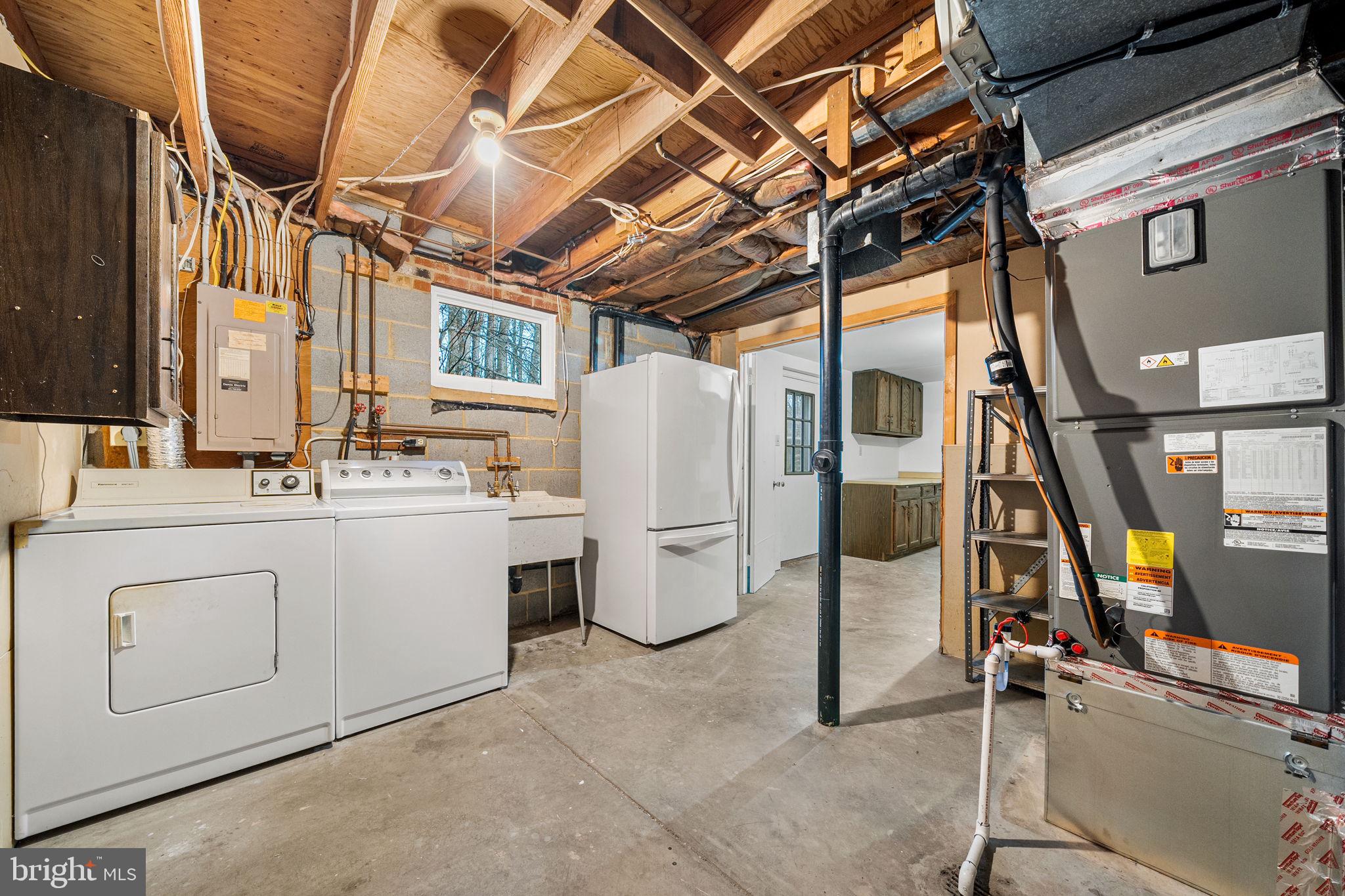 7149 Game Lord Drive Springfield, VA 22153 - Photo 49 of 59 Laundry Room & Access to Rear Yard