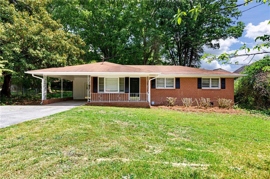 2901 New MacLand Road Powder Springs, GA 30127 - Photo 1 of 1 a view of a house with a backyard