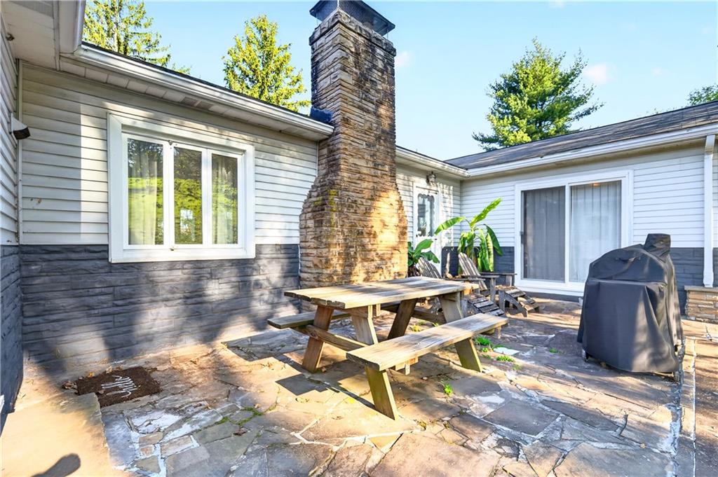 1188 Willowbrook Road Belle Vernon, PA 15012 - Photo 14 of 50 a view of backyard with a patio