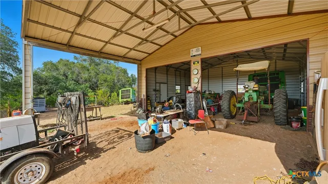 a view of swimming pool with outdoor seating