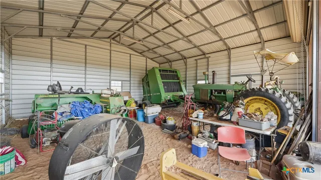 a house view with a garden space and entertaining space