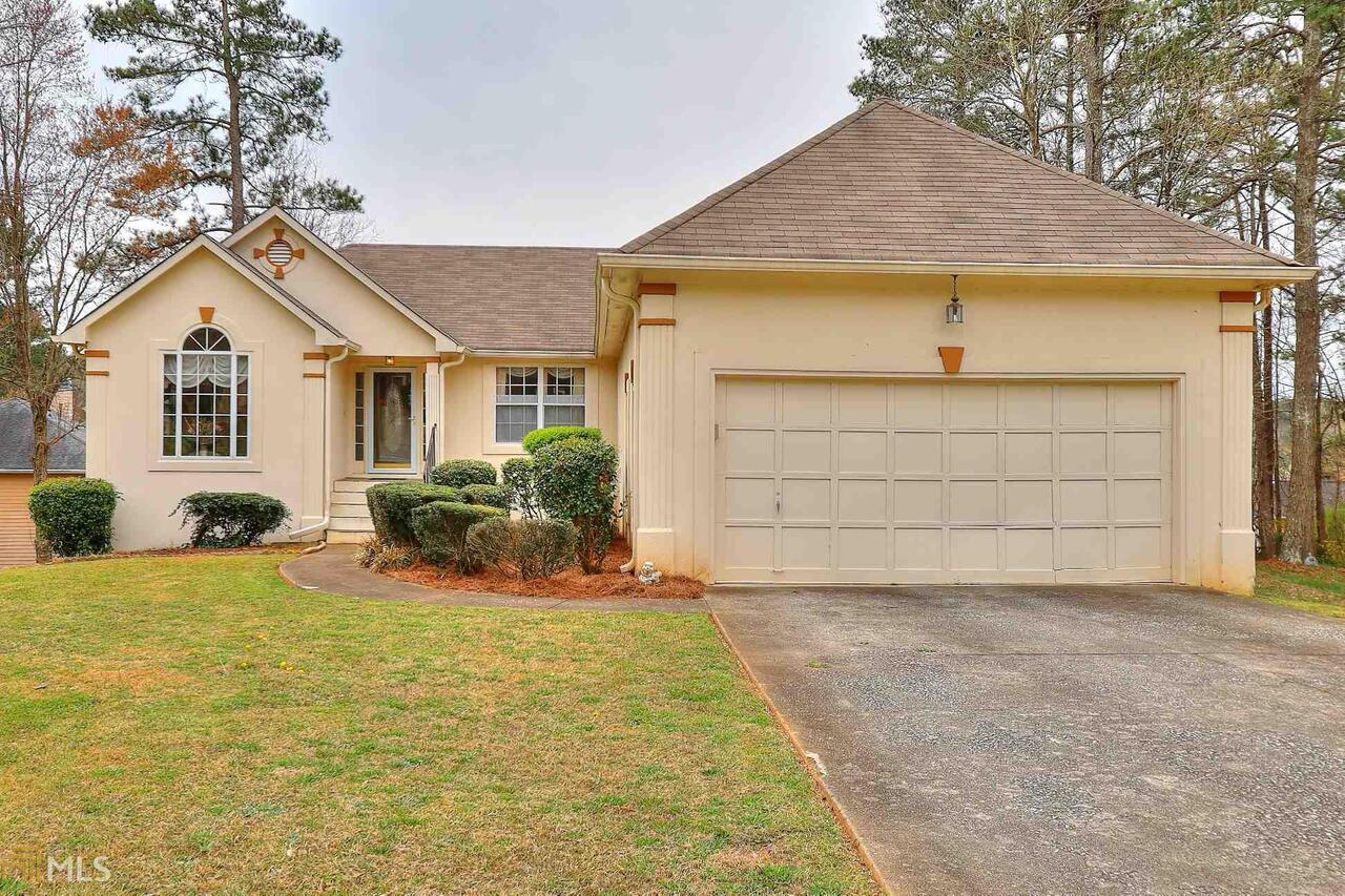 970 Reunion Place Southwest Atlanta, GA 30331 - Photo 1 of 1 a view of a house with backyard and garden