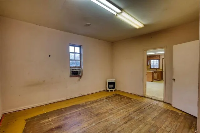 a view of a livingroom with wooden floor