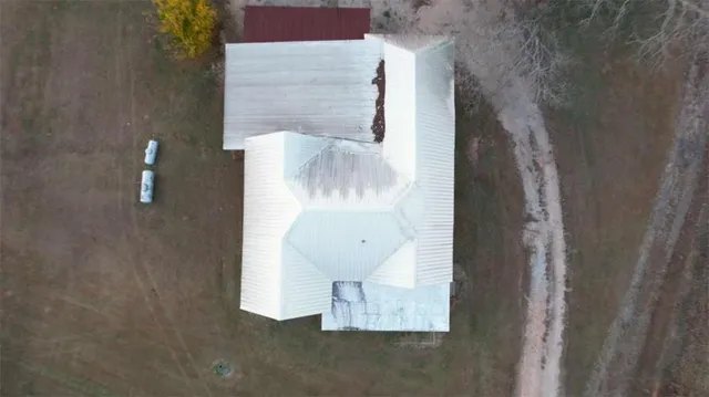 a view of a terrace with a lake and mountain view