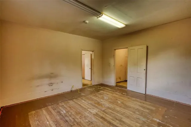 a living room with furniture rug and window