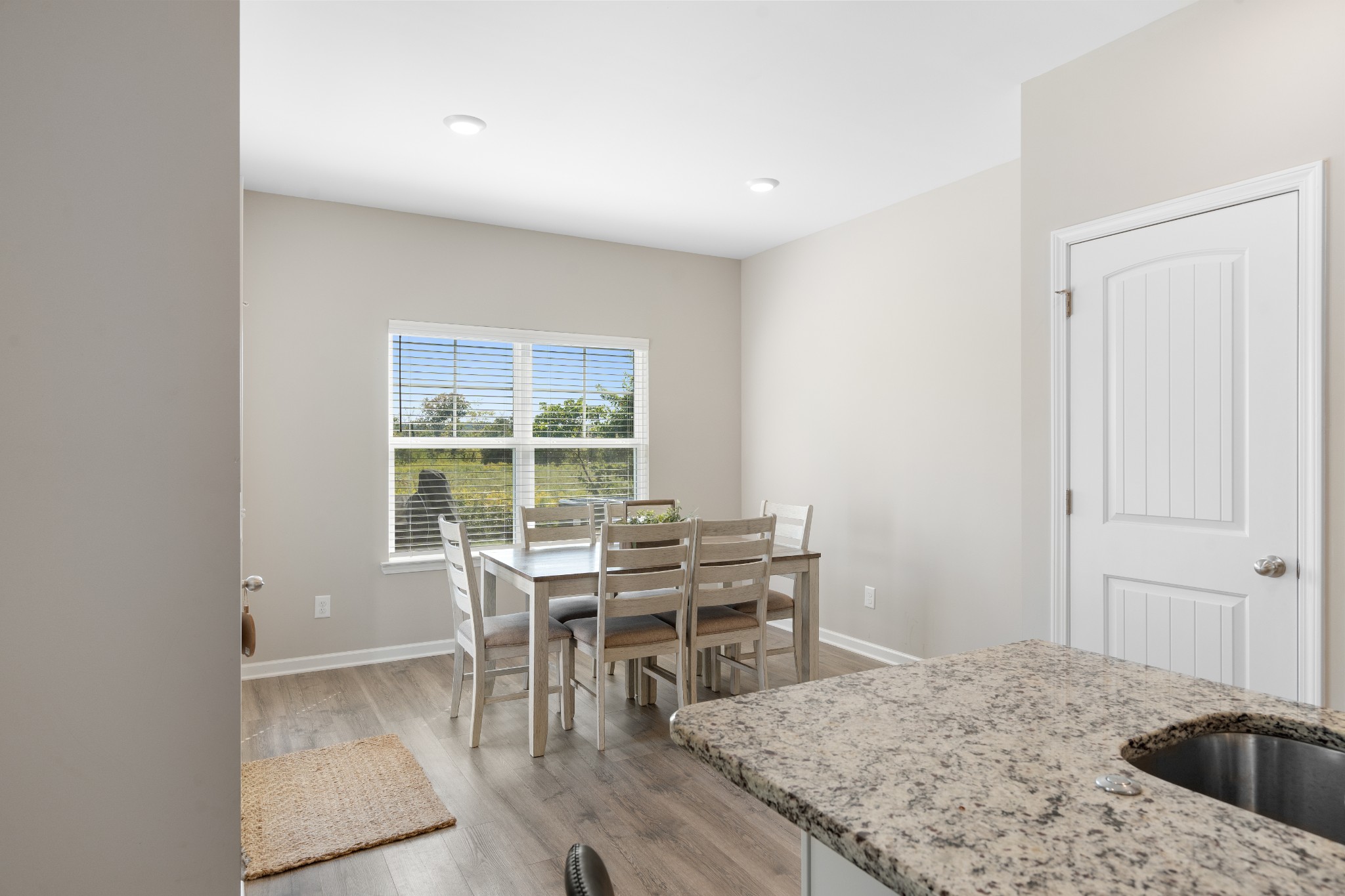 284 Thorpe Drive Spring Hill, TN 37174 - Photo 15 of 34 a view of a dining room with furniture and wooden floor