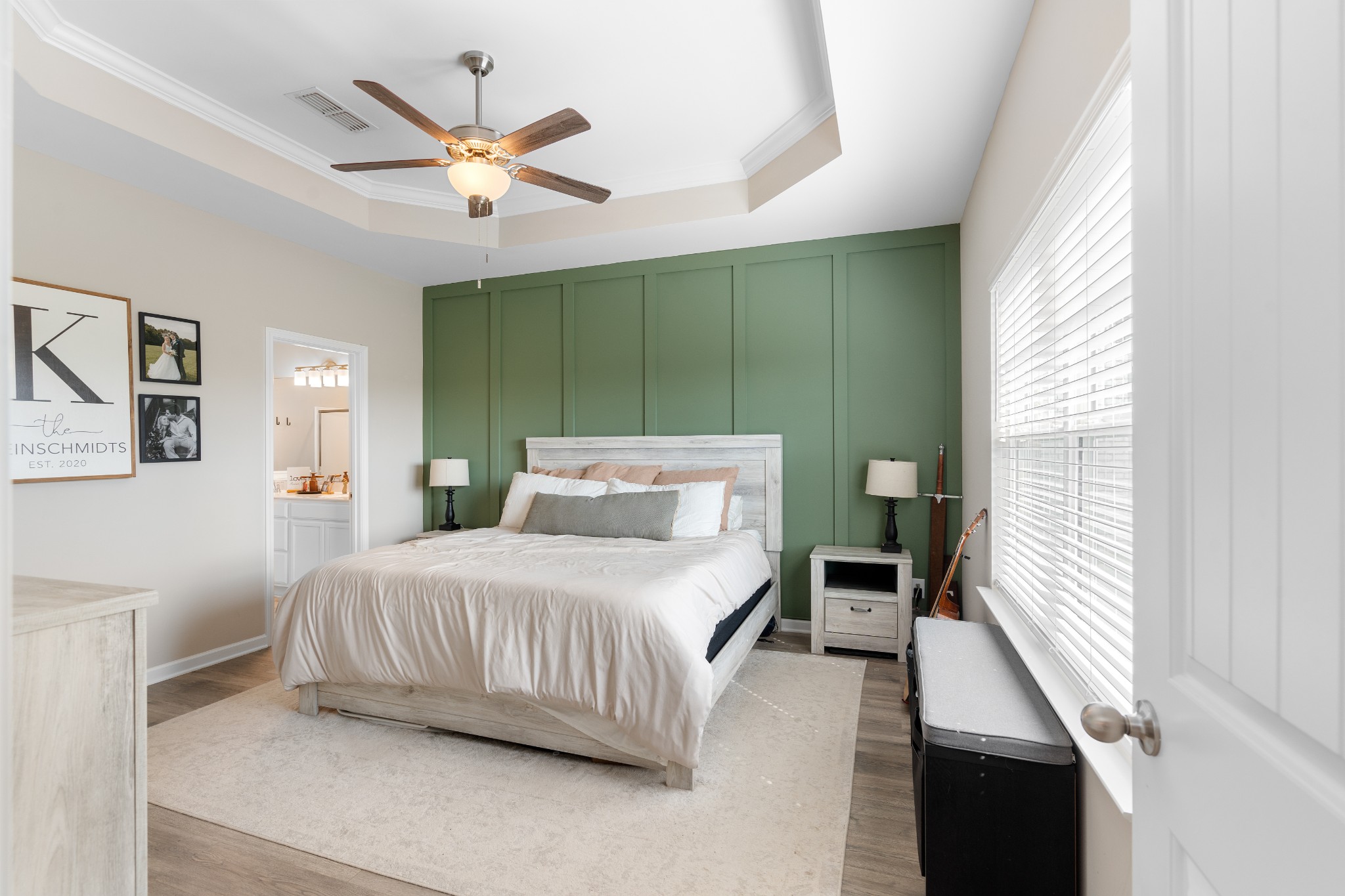 284 Thorpe Drive Spring Hill, TN 37174 - Photo 17 of 34 a bedroom with a large bed window and a ceiling fan