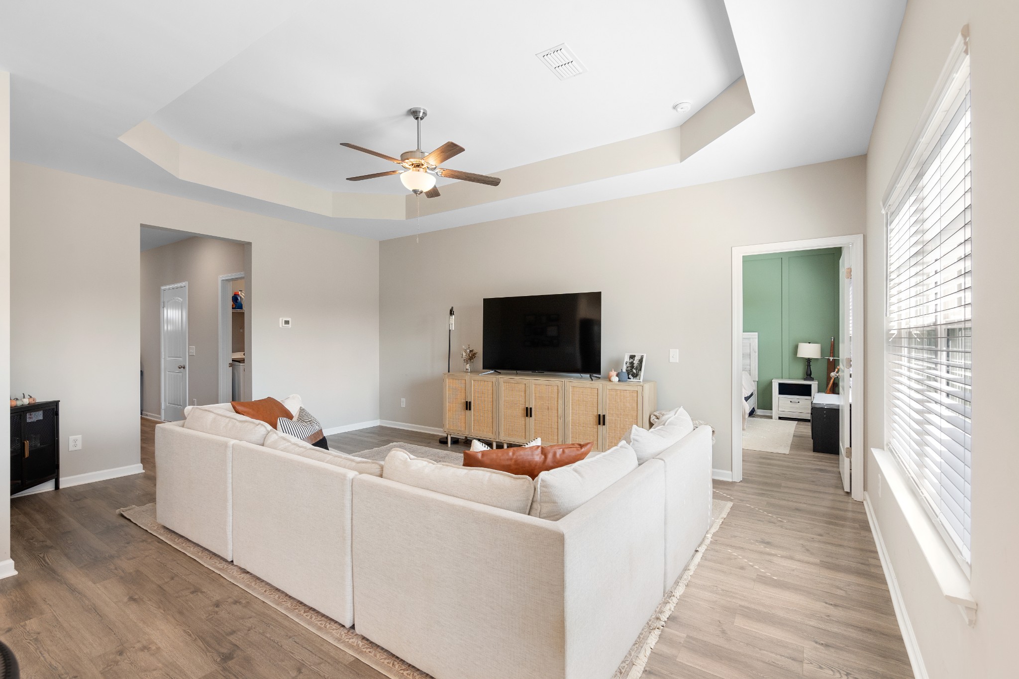 284 Thorpe Drive Spring Hill, TN 37174 - Photo 8 of 34 a living room with furniture and a flat screen tv