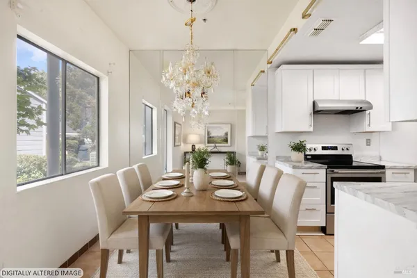 a view of a dining room with furniture window and outside view