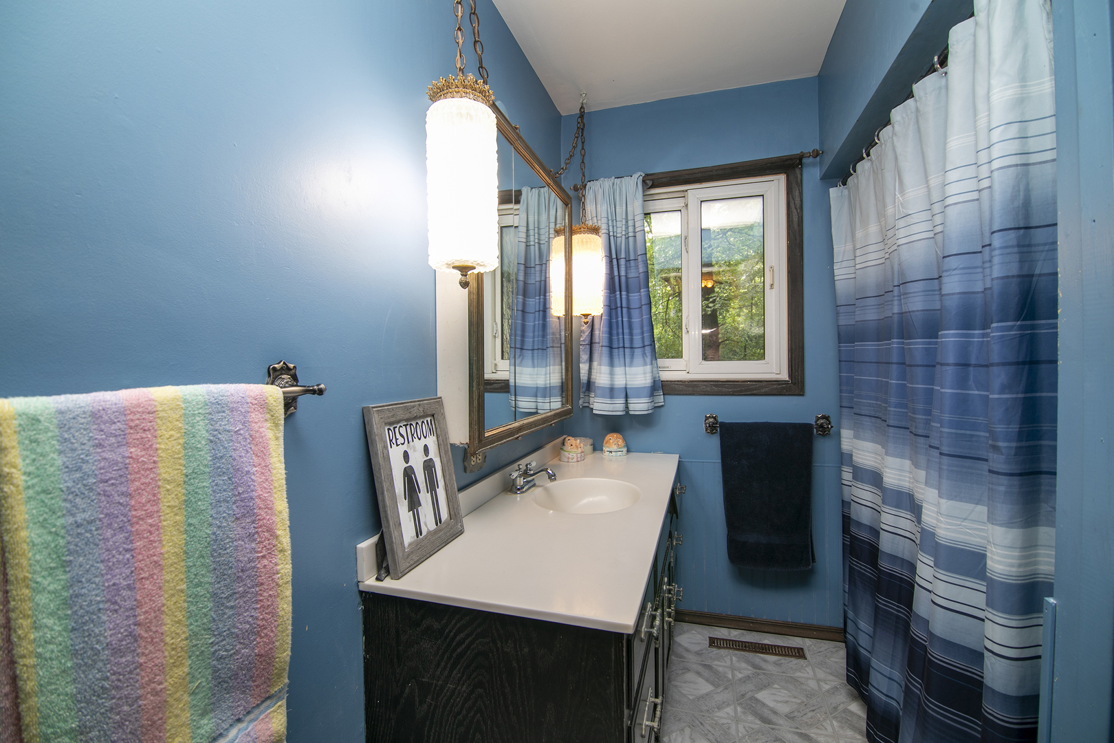 418 South 5000W Road Kankakee, IL 60901 - Photo 12 of 38 a bathroom with a sink toilet and window