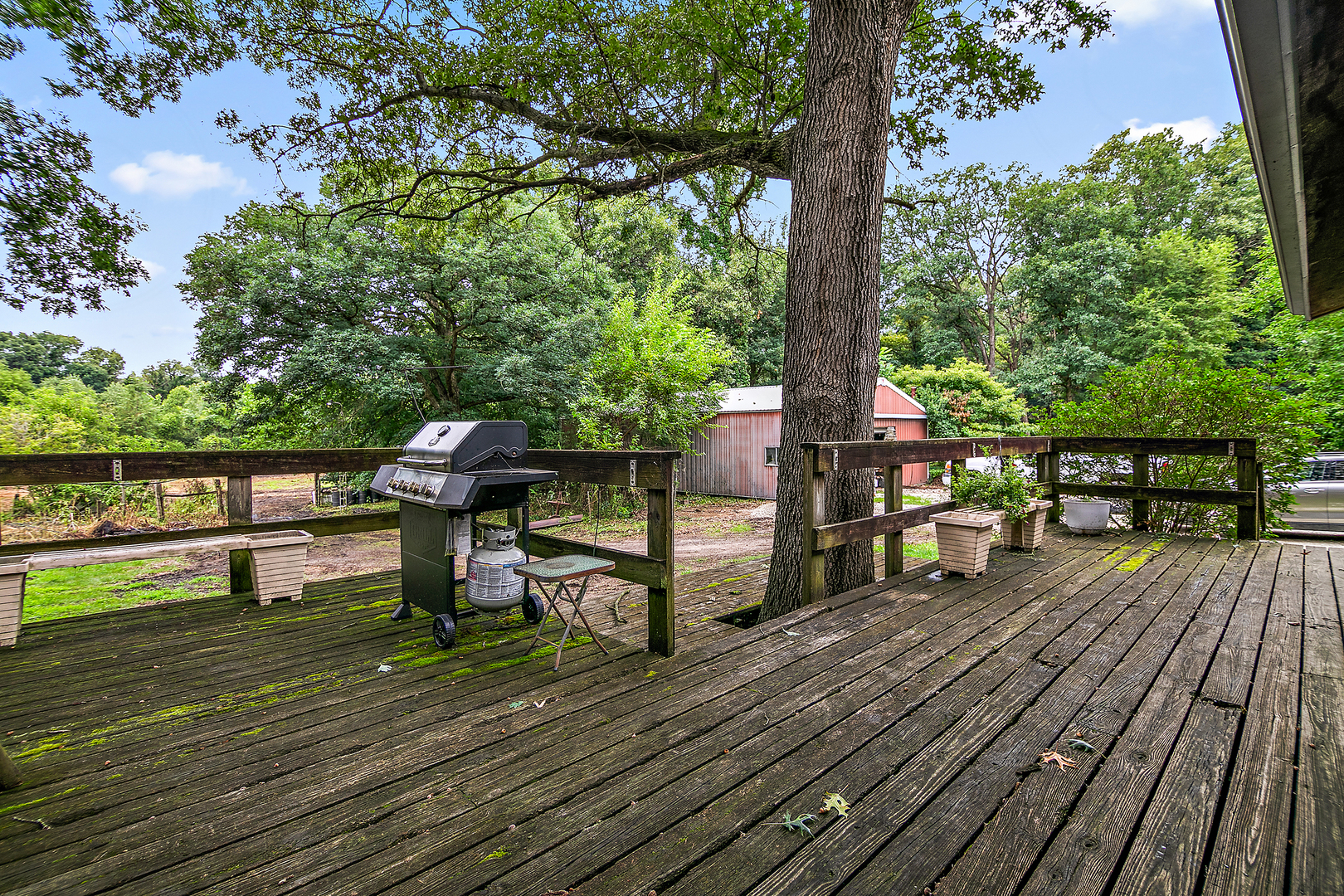 418 South 5000W Road Kankakee, IL 60901 - Photo 19 of 38 a view of deck with table and chairs and wooden floor