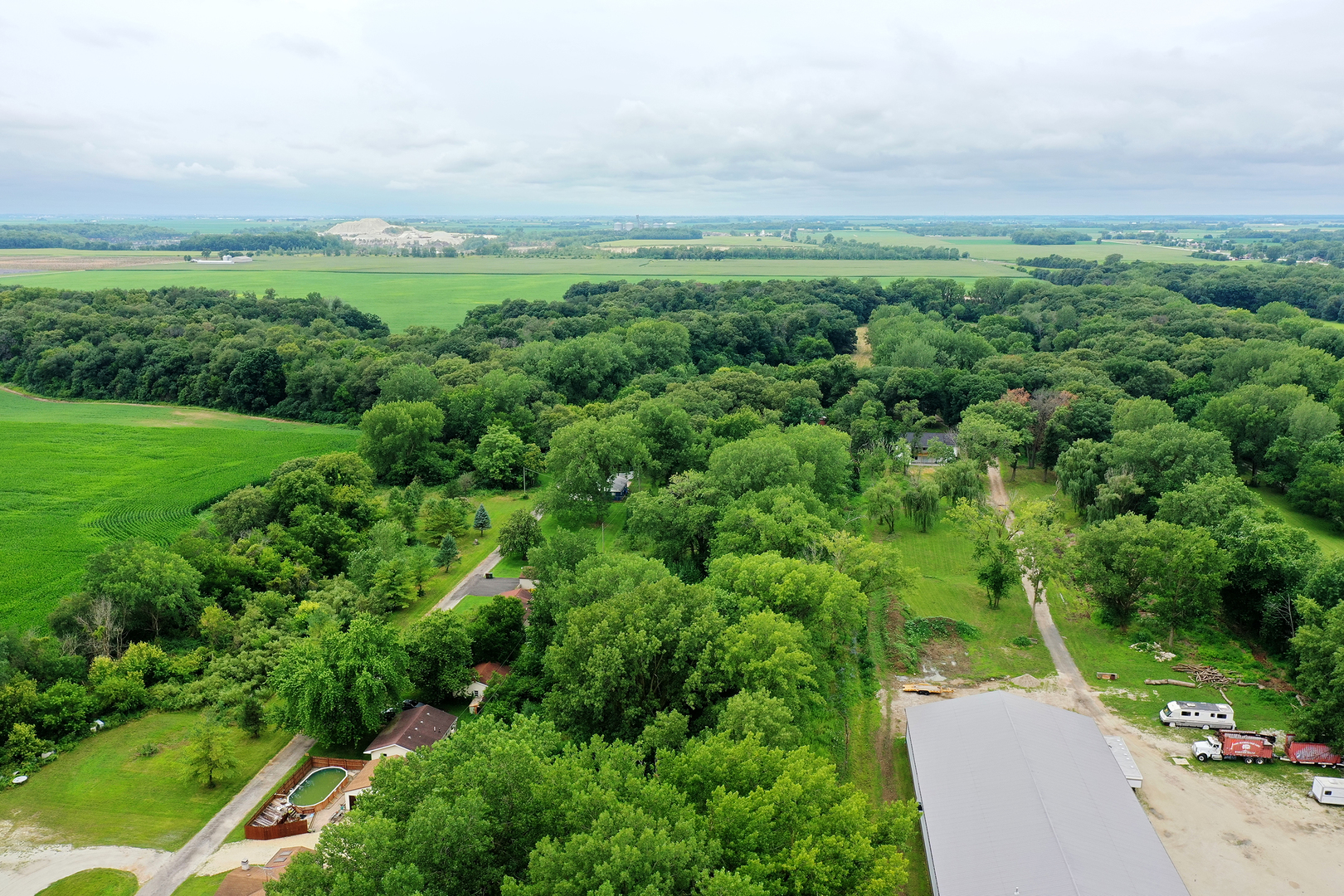 418 South 5000W Road Kankakee, IL 60901 - Photo 30 of 38 an aerial view of a house with a yard