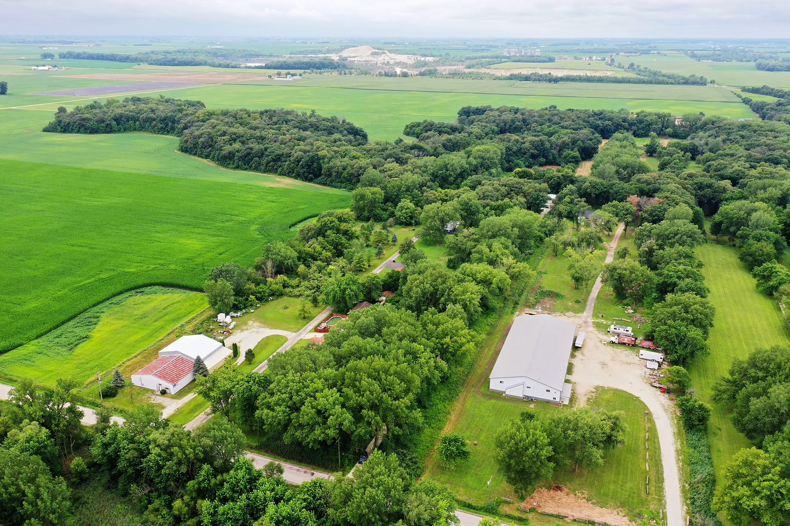 418 South 5000W Road Kankakee, IL 60901 - Photo 31 of 38 an aerial view of a houses with outdoor space and city view