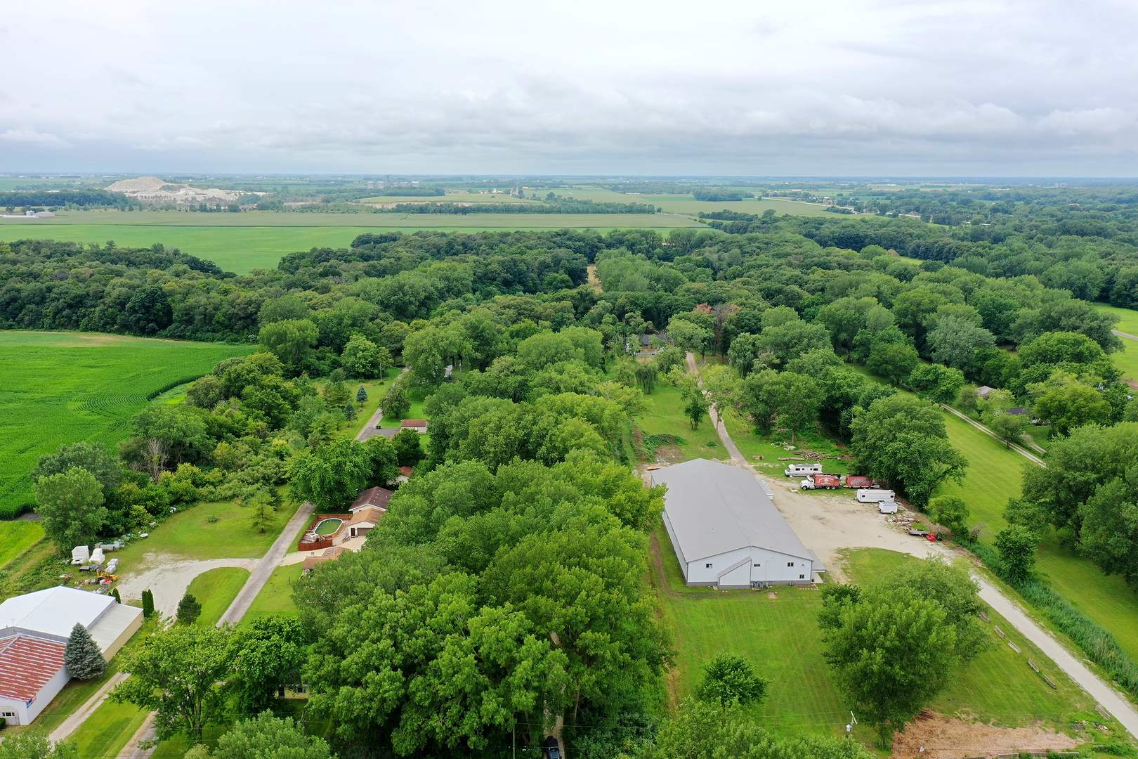 418 South 5000W Road Kankakee, IL 60901 - Photo 34 of 38 an aerial view of a house with a yard