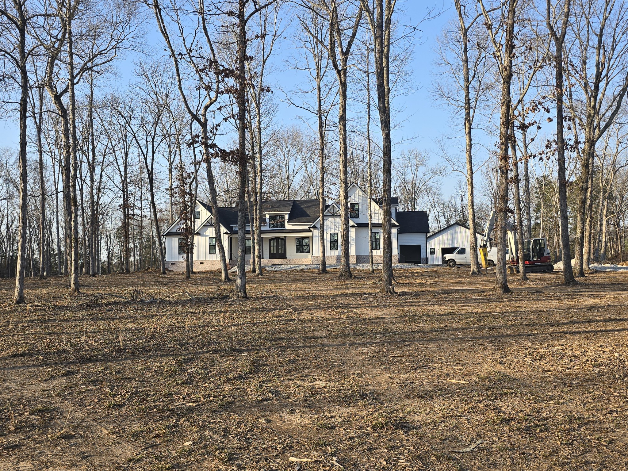 4833 Kedron Road Spring Hill, TN 37174 - Photo 1 of 6 a house with trees in front of it