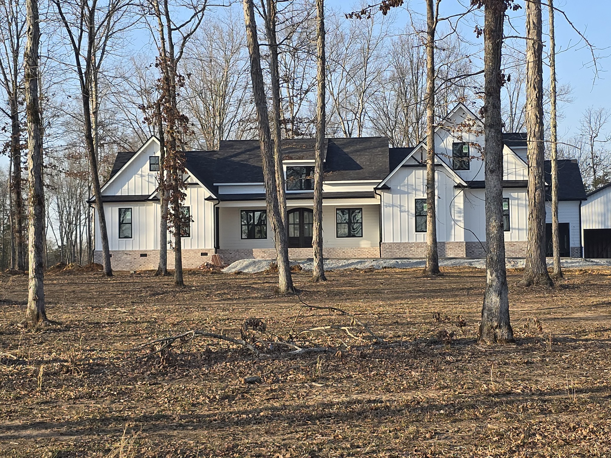 4833 Kedron Road Spring Hill, TN 37174 - Photo 2 of 6 a front view of a house with a yard
