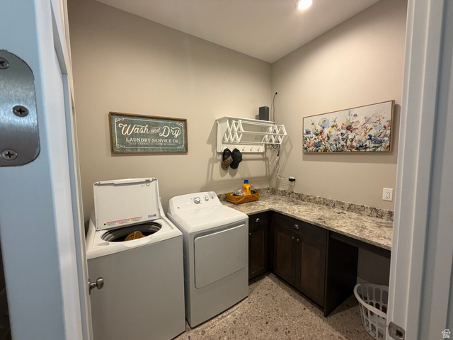 1325 South Round Road East Laketown, UT 84038 - Photo 32 of 40 Dedicated laundry room with textured flooring, dark wood-finish cabinetry, and light-toned countertops