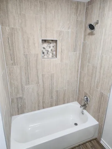 a bathroom with a bathtub