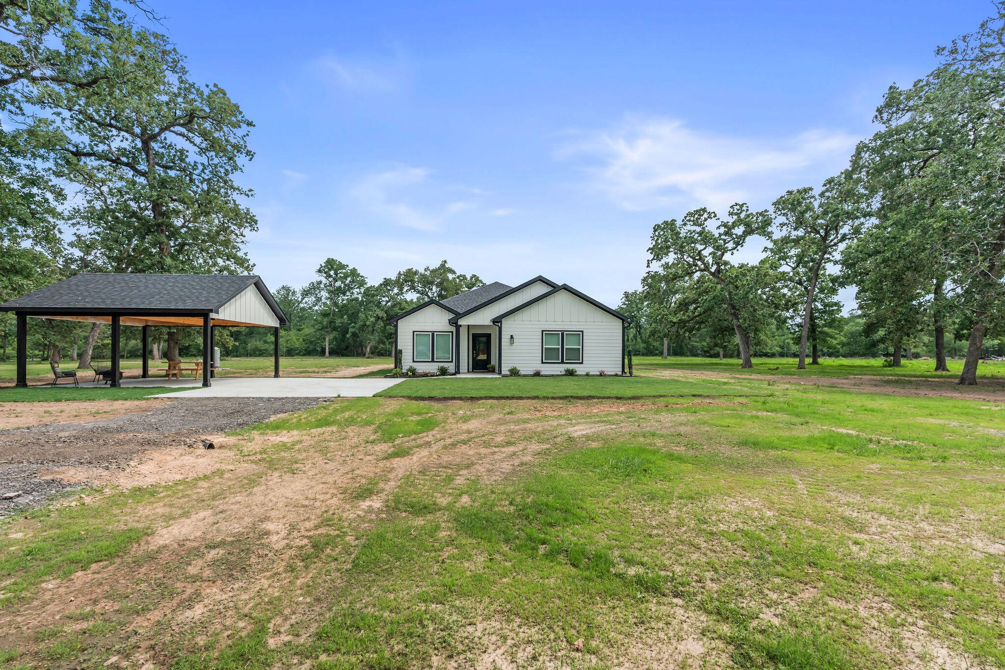 39645 Bosque Road Hempstead, TX 77445 - Photo 2 of 37 a front view of a house with a yard
