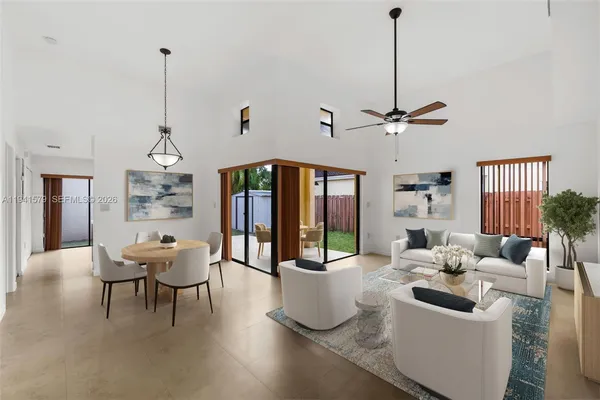 a view of a livingroom with furniture and windows