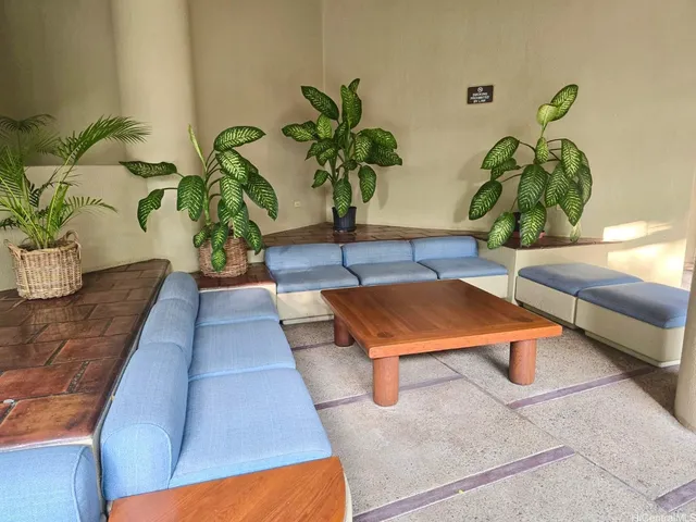a living room with patio furniture