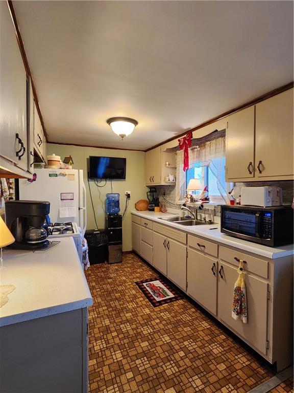 1681 Shady Plain Road Apollo, PA 15613 - Photo 4 of 25 a kitchen that has a lot of cabinets in it and appliances