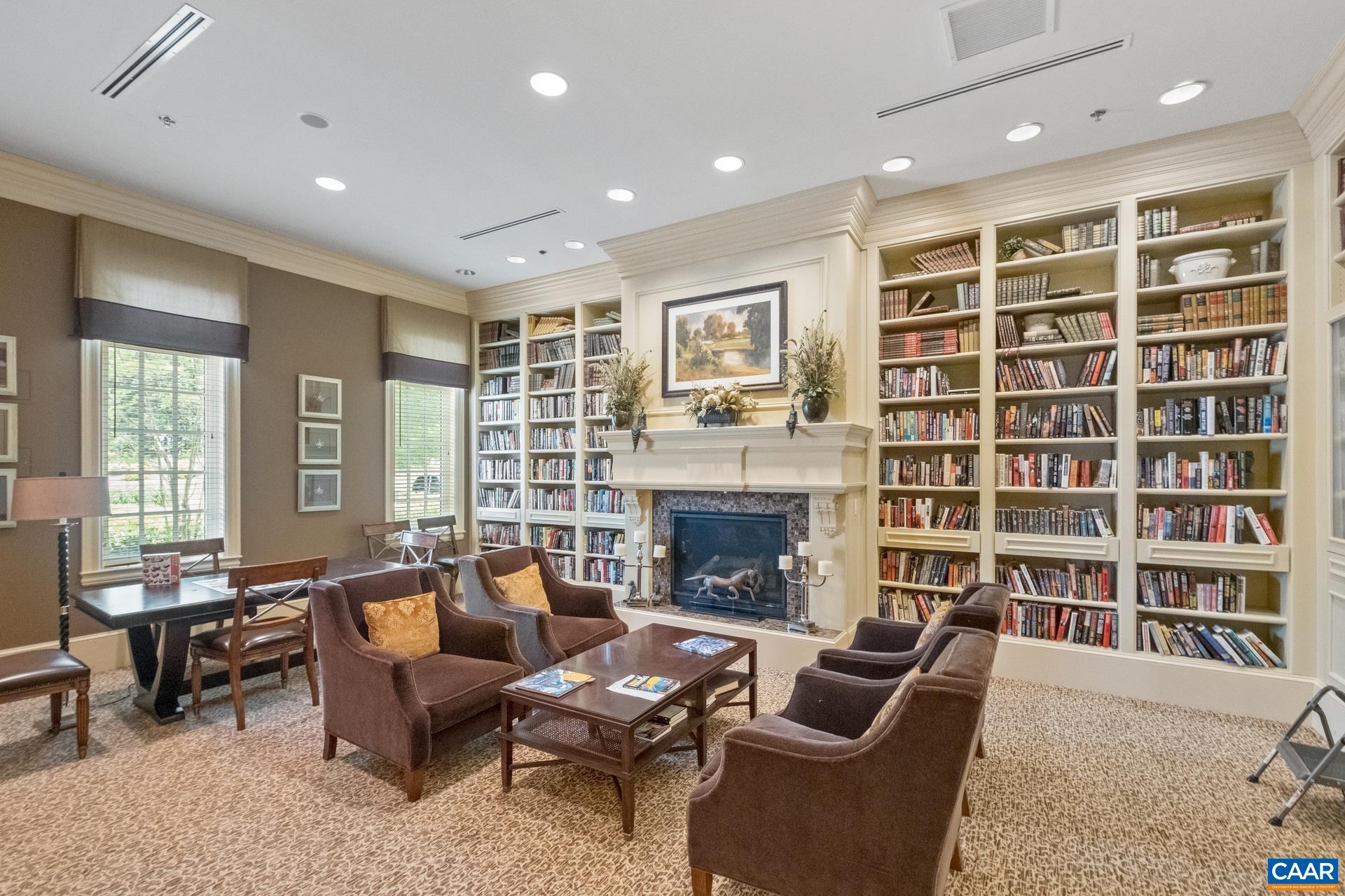 124 Stodghill Drive Ruckersville, VA 22968 - Photo 53 of 58 a living room with furniture and a fireplace