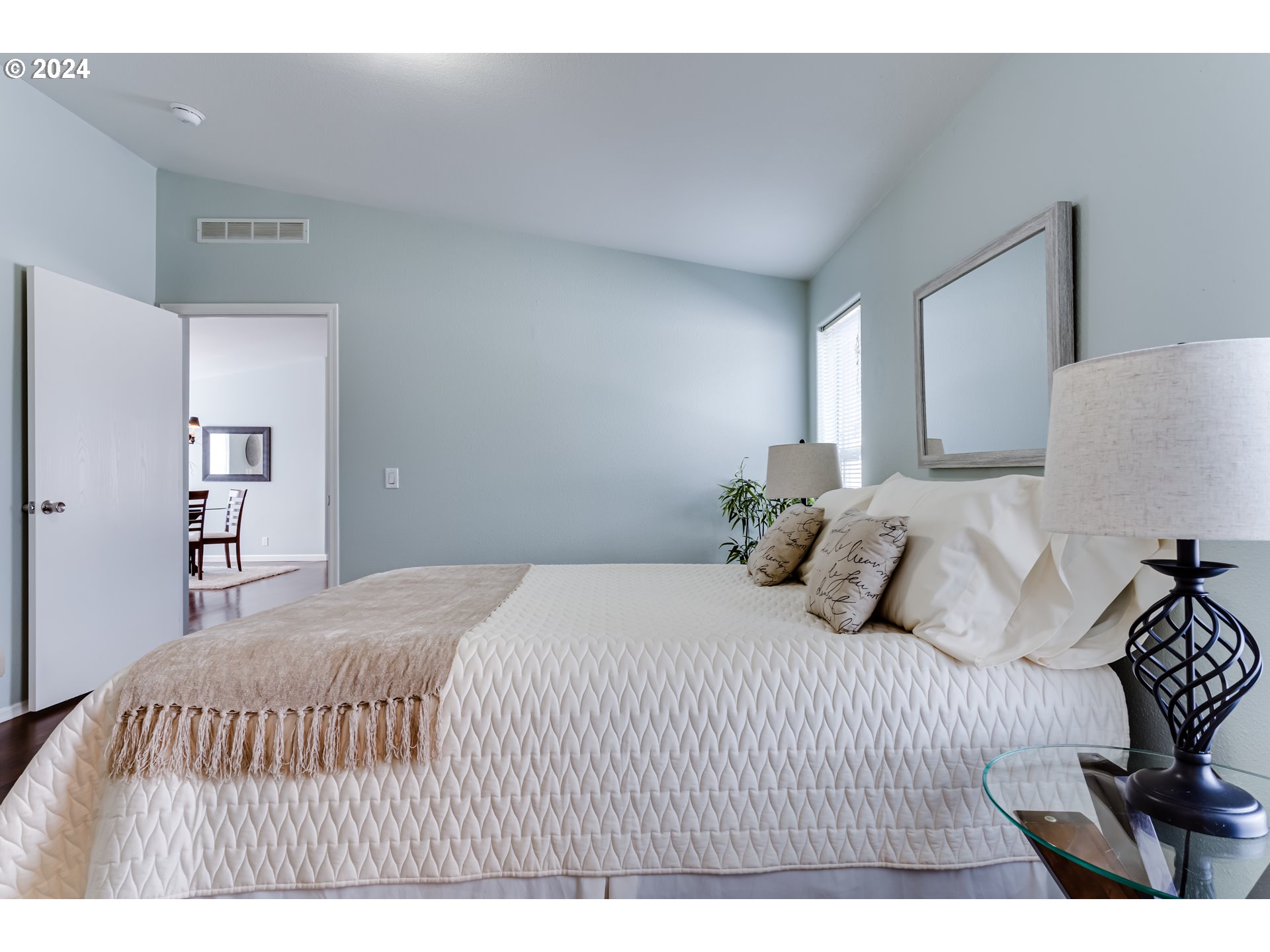 2533 Maia Loop Springfield, OR 97477 - Photo 12 of 28 a bedroom with a bed and a night stand