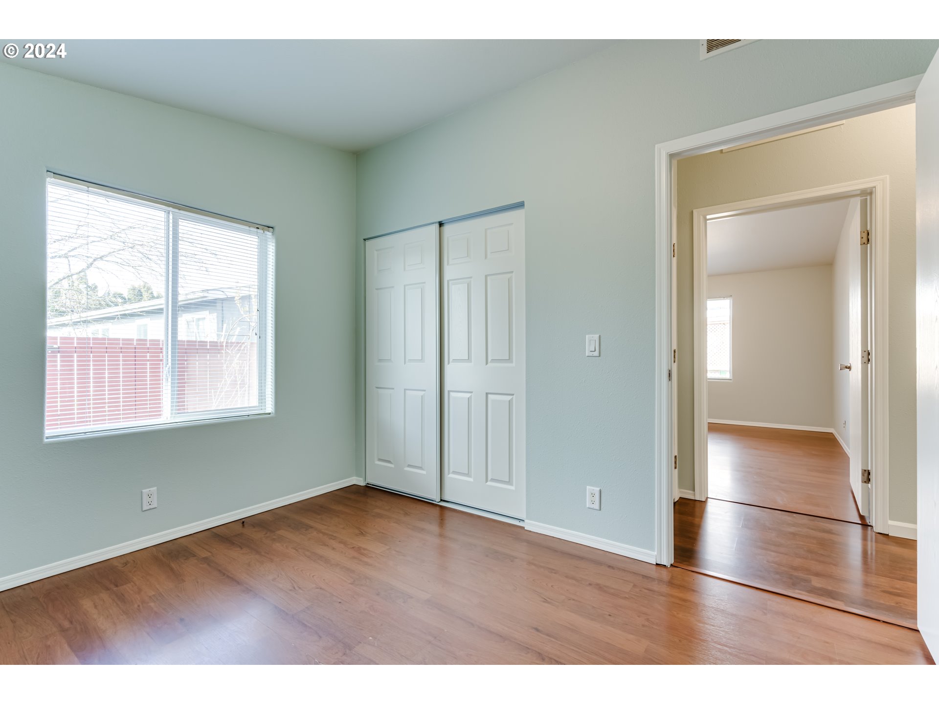 2533 Maia Loop Springfield, OR 97477 - Photo 17 of 28 a view of empty room with wooden floor and fan