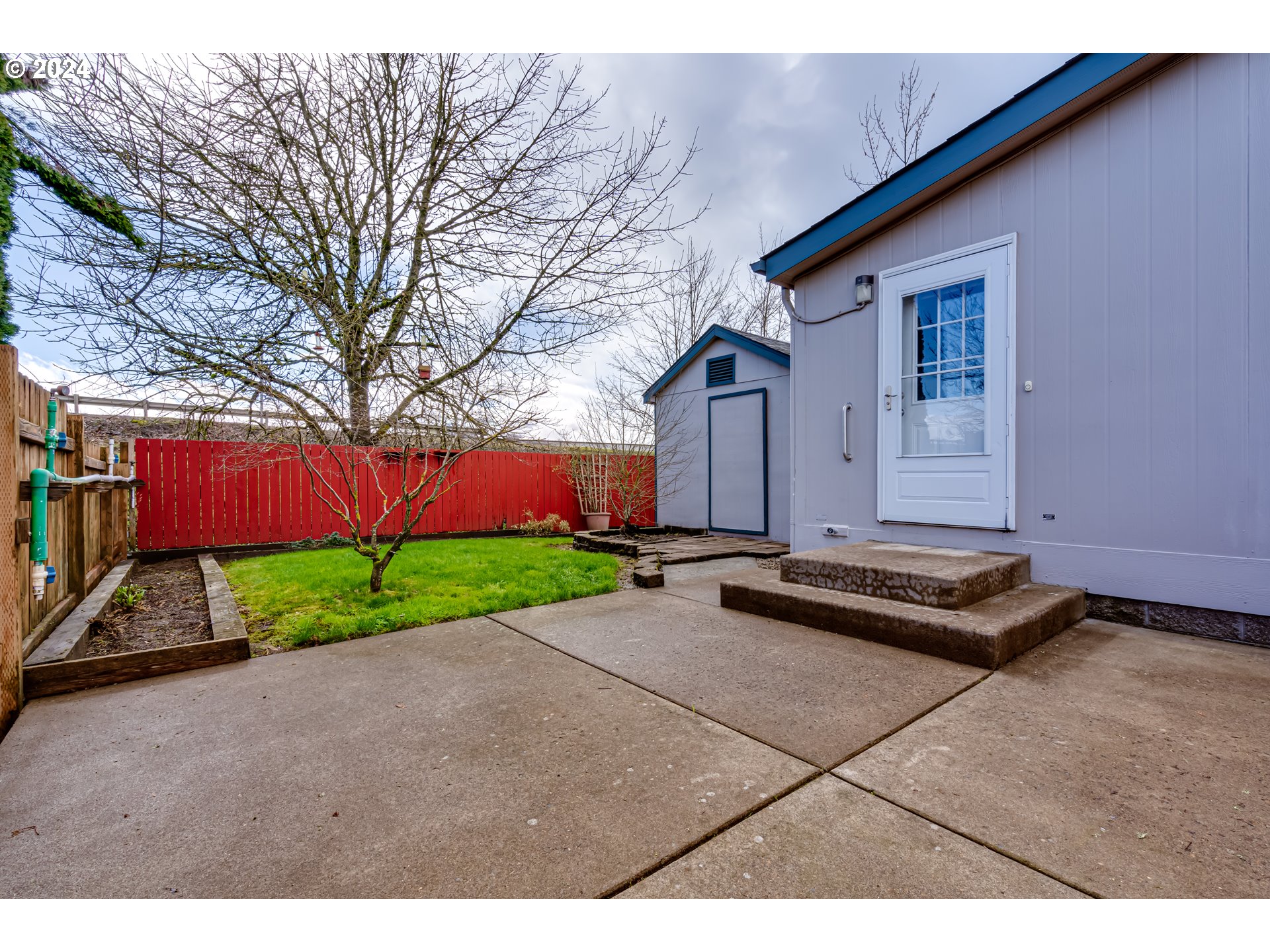2533 Maia Loop Springfield, OR 97477 - Photo 23 of 28 a front view of a house with a yard and garage