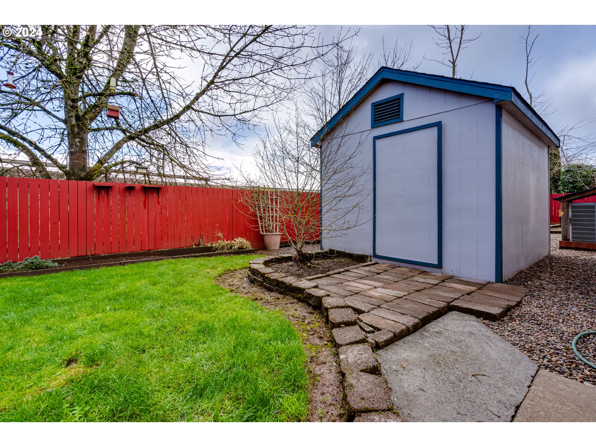 2533 Maia Loop Springfield, OR 97477 - Photo 24 of 28 a view of backyard of house with wooden fence