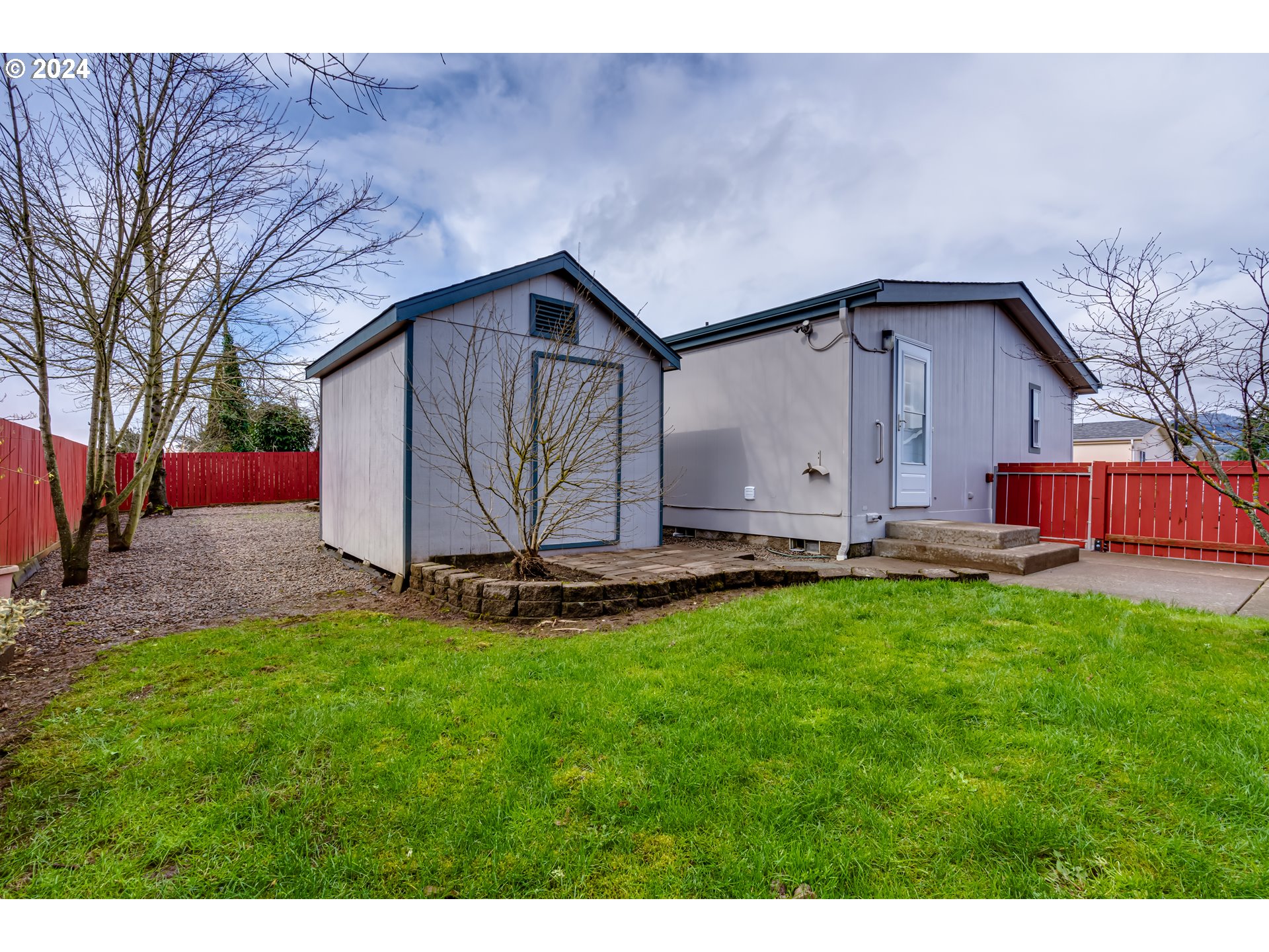 2533 Maia Loop Springfield, OR 97477 - Photo 25 of 28 a front view of house with yard and seating area