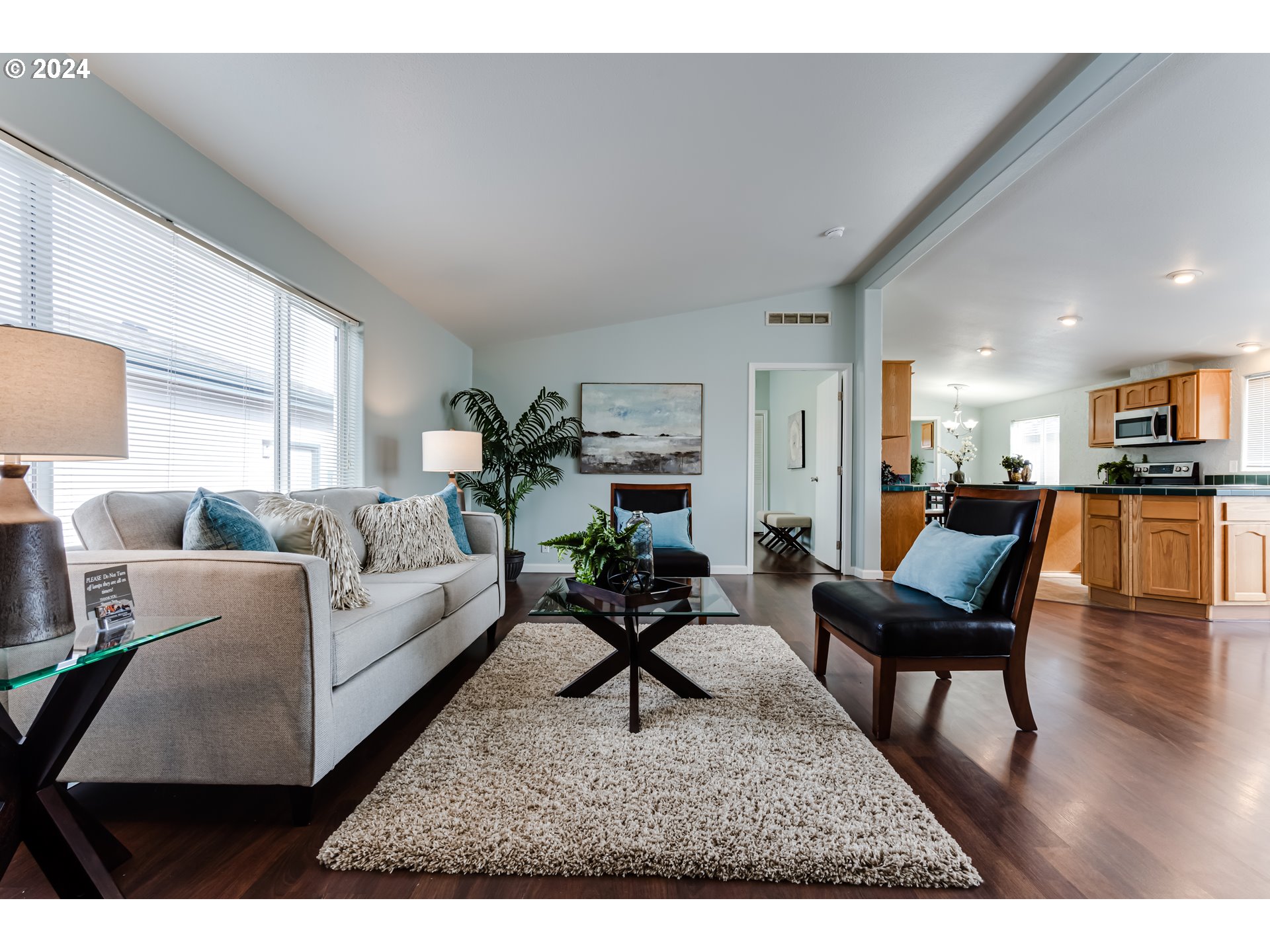 2533 Maia Loop Springfield, OR 97477 - Photo 3 of 28 a living room with furniture and a wooden floor
