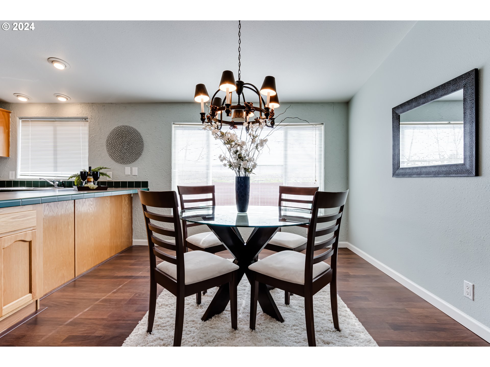 2533 Maia Loop Springfield, OR 97477 - Photo 5 of 28 a view of a dining room with furniture and chandelier