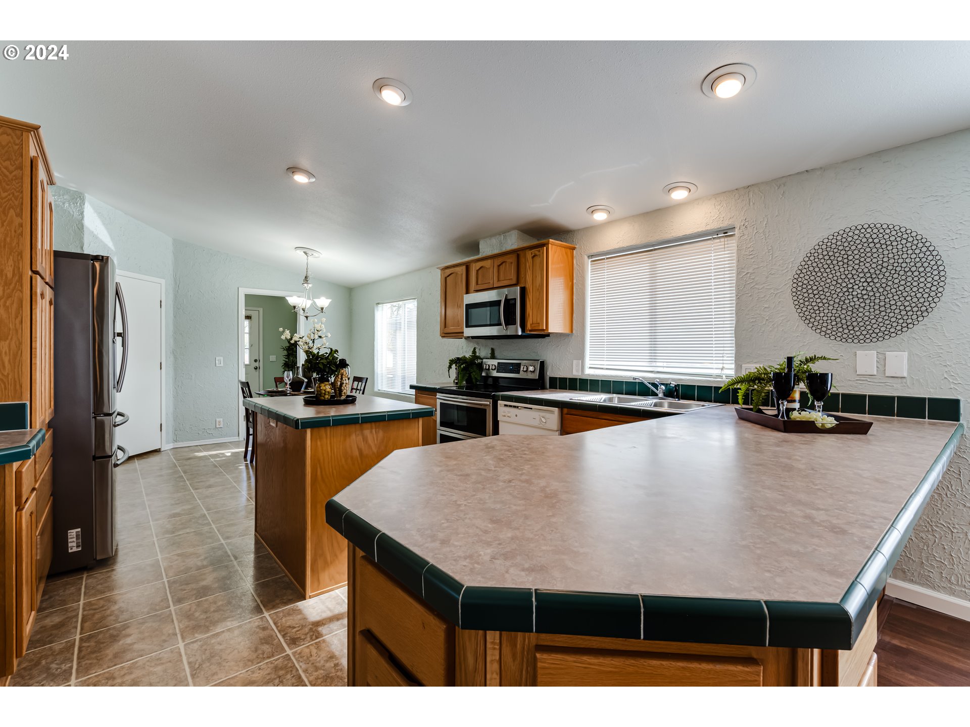 2533 Maia Loop Springfield, OR 97477 - Photo 6 of 28 a kitchen with counter space cabinets and appliances