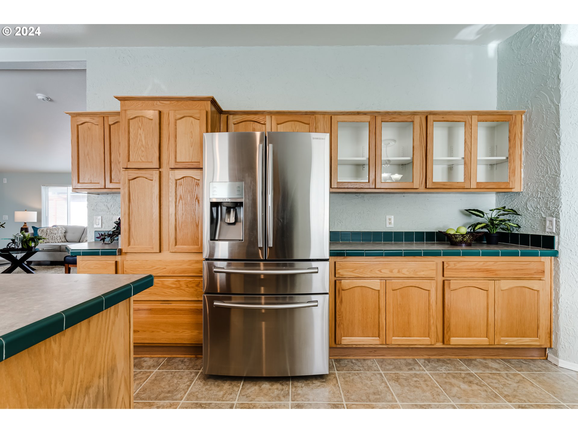 2533 Maia Loop Springfield, OR 97477 - Photo 8 of 28 a kitchen with stainless steel appliances granite countertop a refrigerator a stove and a sink with granite countertops