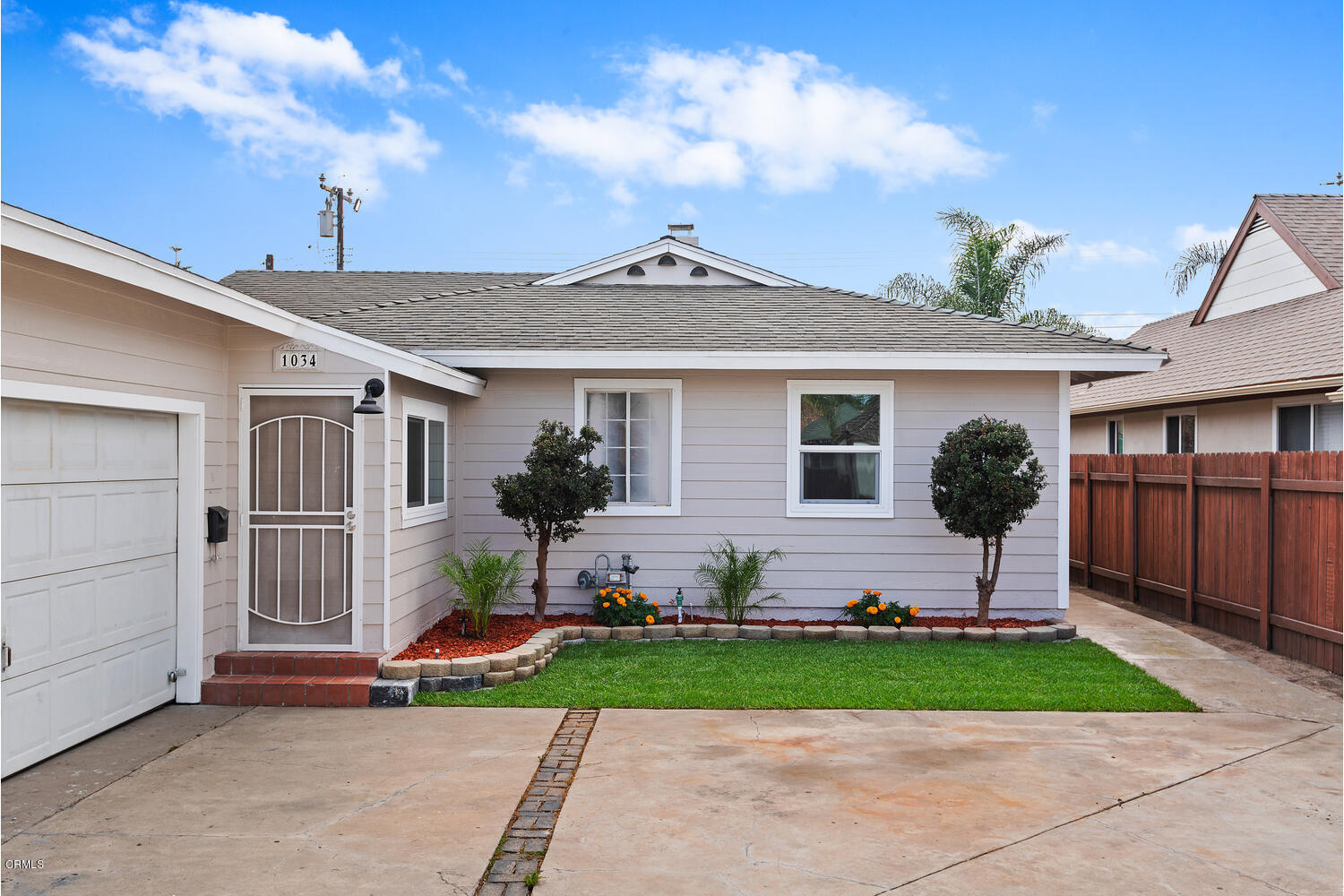 1034 West Roderick Avenue Oxnard, CA 93030 - Photo 2 of 20 a view of house with yard and outdoor space