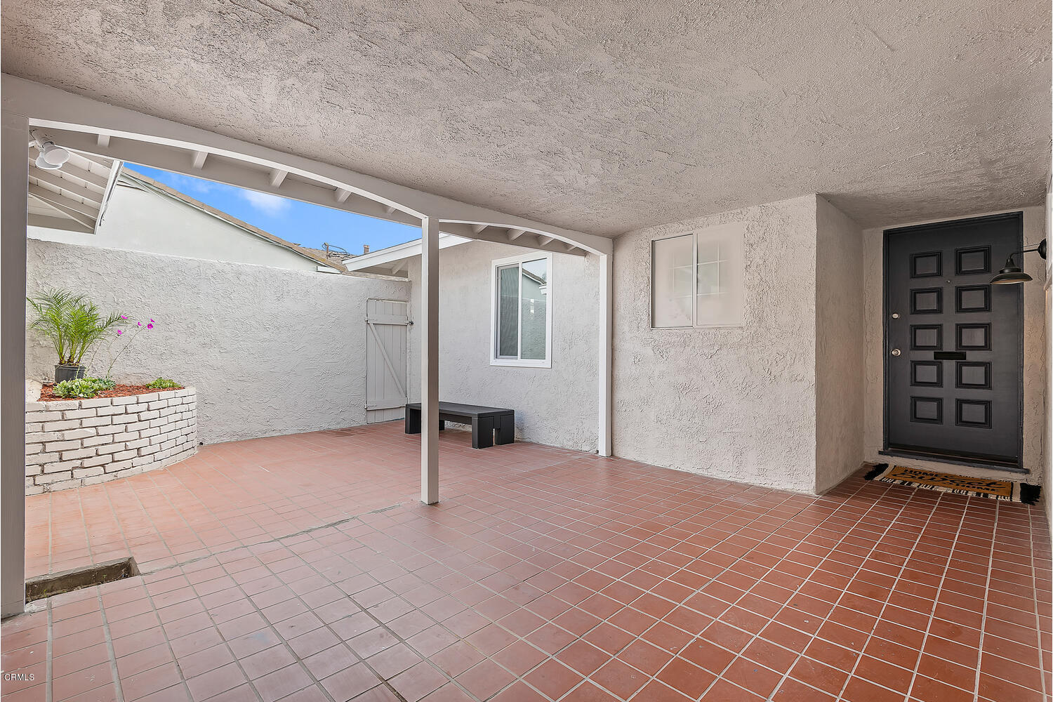 1034 West Roderick Avenue Oxnard, CA 93030 - Photo 3 of 20 a view of an empty room with a window