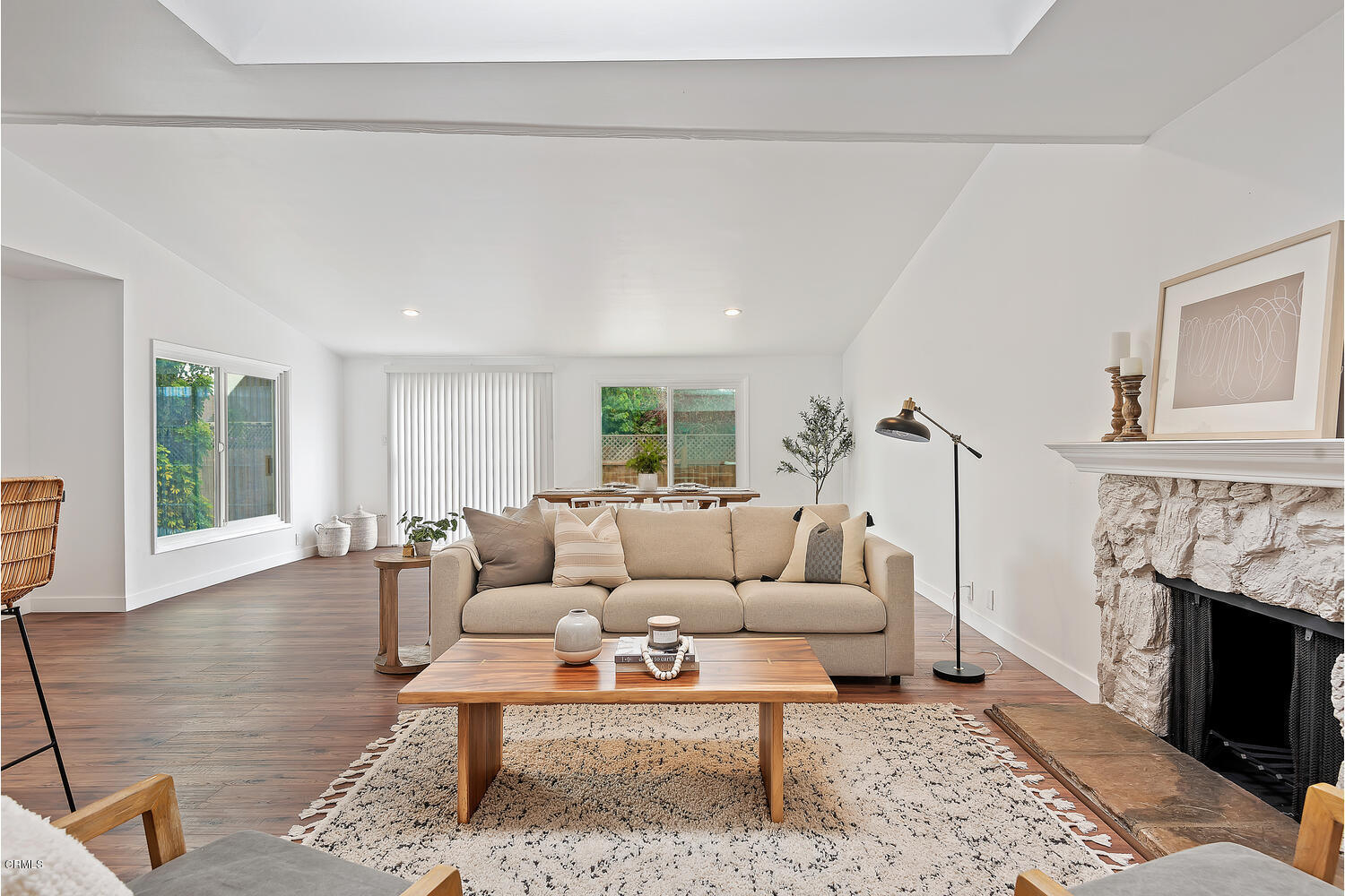 1034 West Roderick Avenue Oxnard, CA 93030 - Photo 5 of 20 a living room with furniture a rug and a fireplace