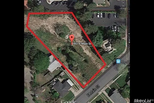 a view of a lake with a yard