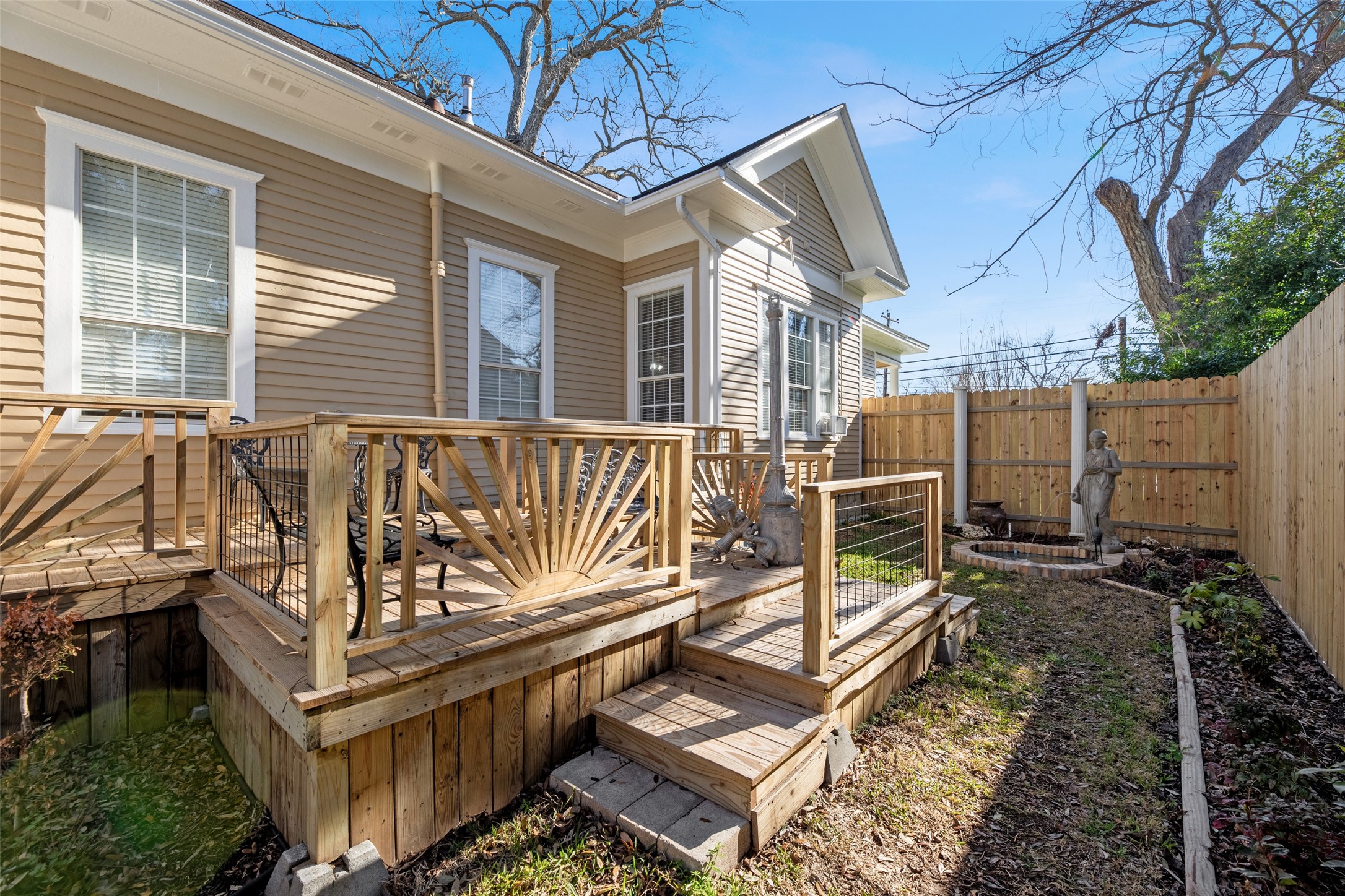 801 North Fulton Street Wharton, TX 77488 - Photo 25 of 43 Side porch and gardens off 3rd bedroom.