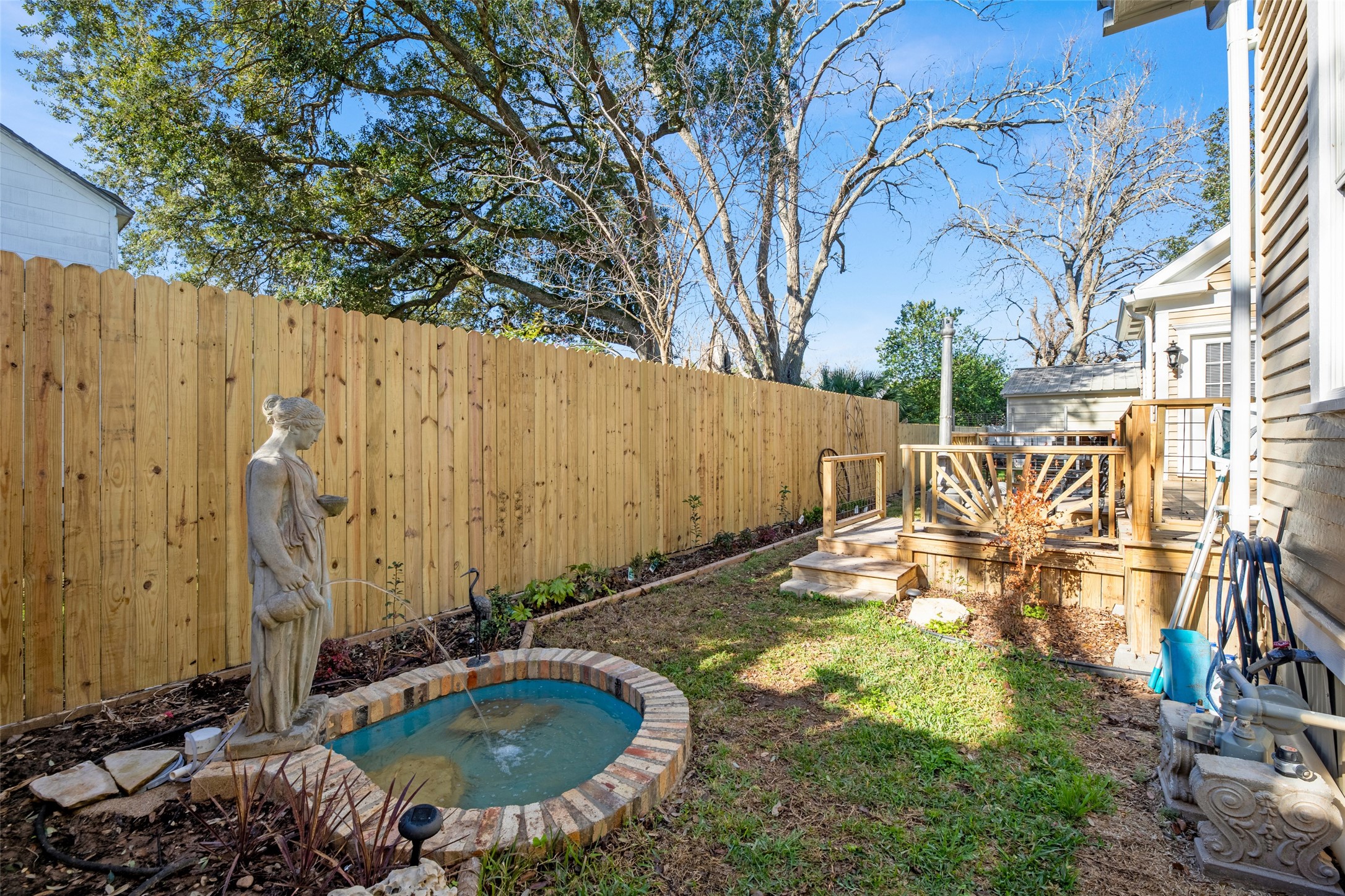 801 North Fulton Street Wharton, TX 77488 - Photo 26 of 43 a view of a swimming pool with a patio