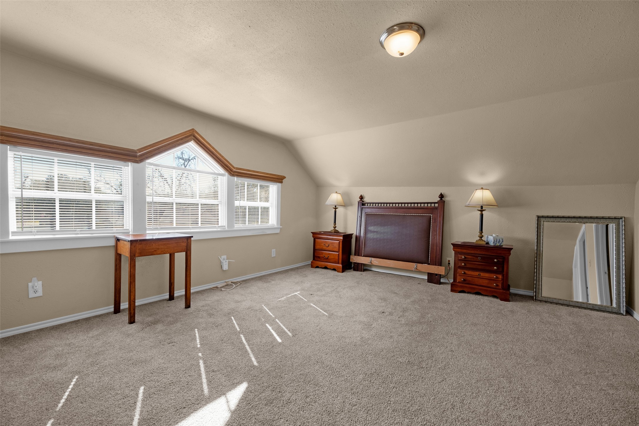 801 North Fulton Street Wharton, TX 77488 - Photo 28 of 43 an empty room with furniture and windows