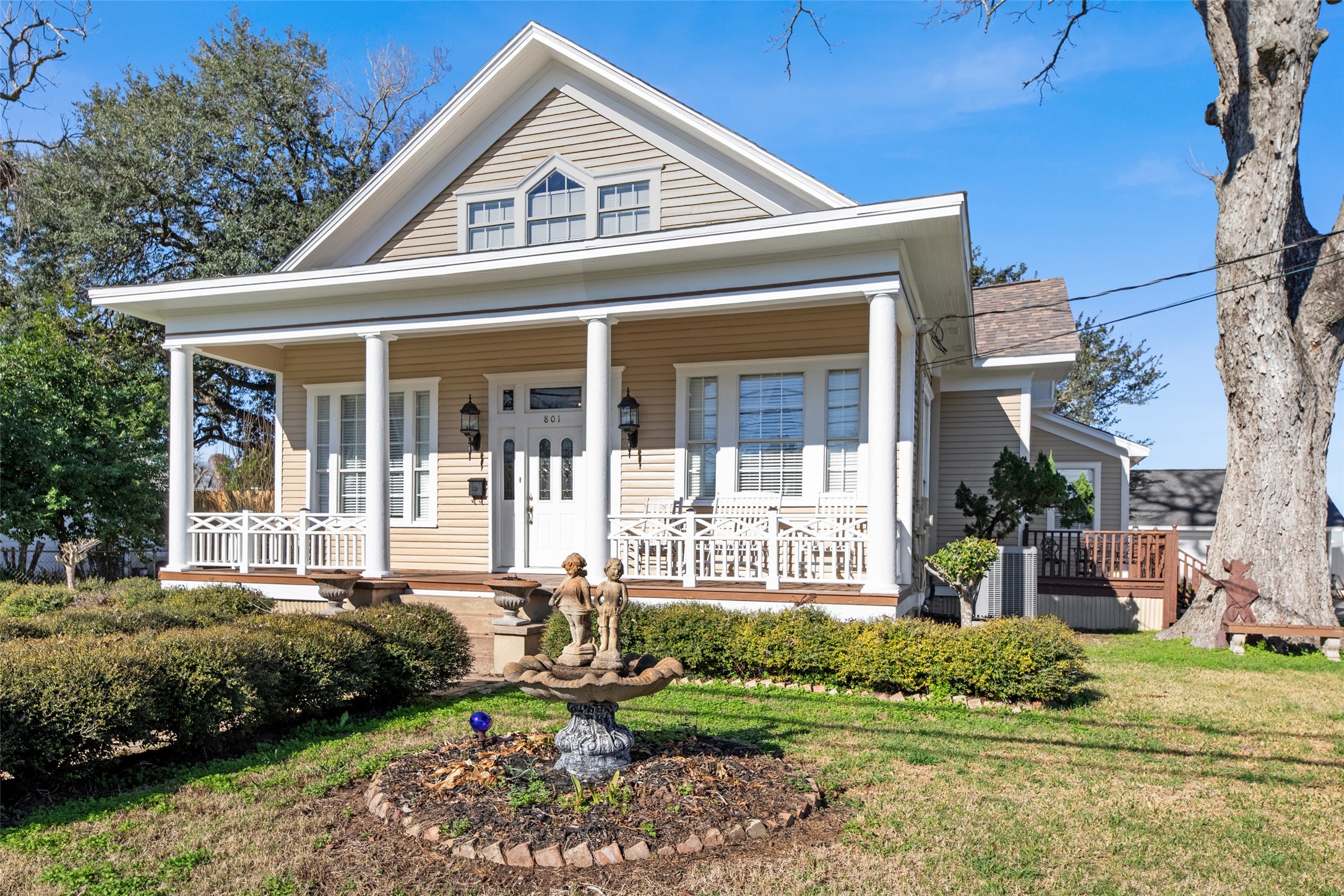801 North Fulton Street Wharton, TX 77488 - Photo 2 of 43 a front view of a house with a yard