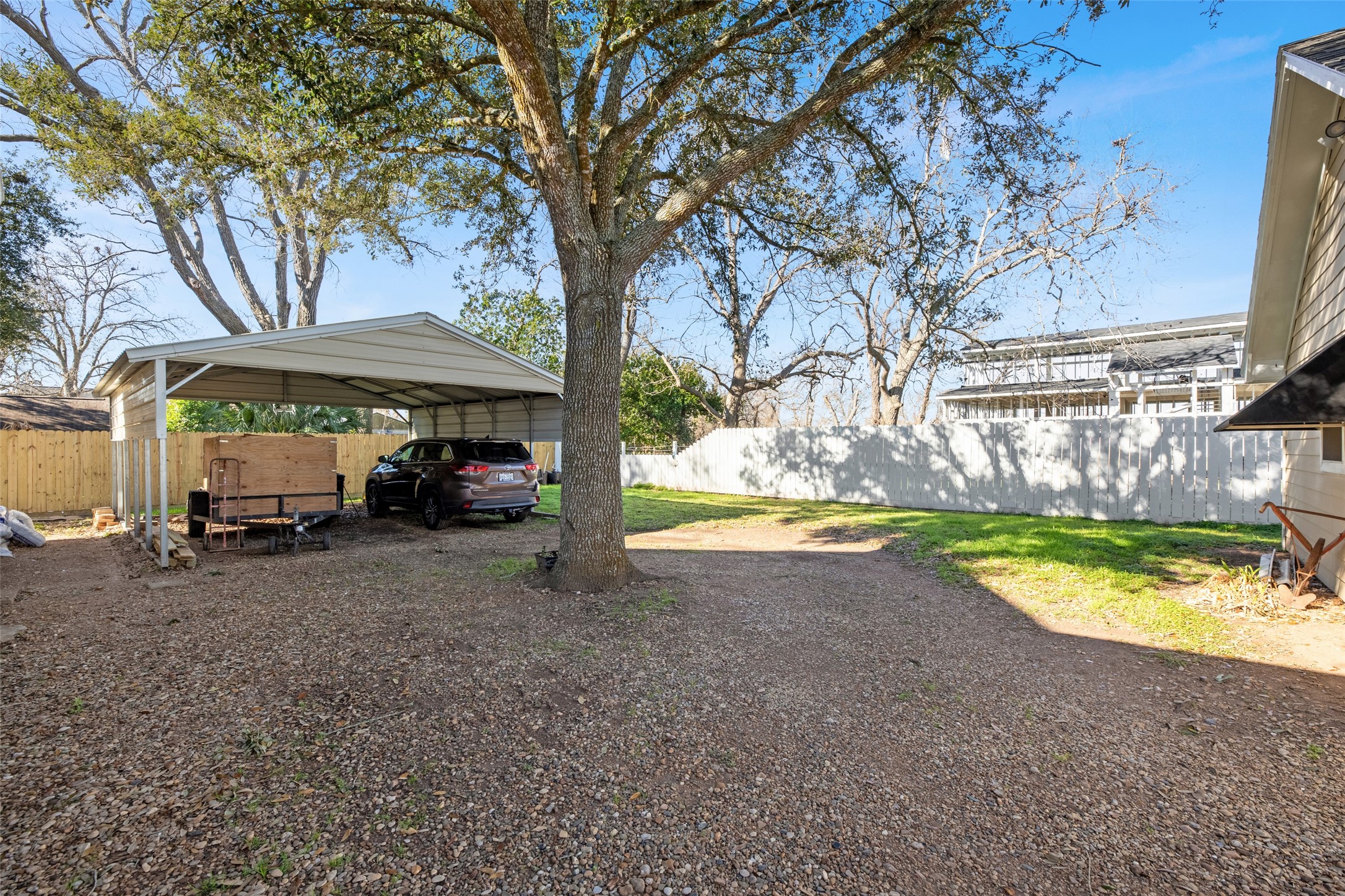 801 North Fulton Street Wharton, TX 77488 - Photo 36 of 43 a view of a house with swimming pool and sitting area