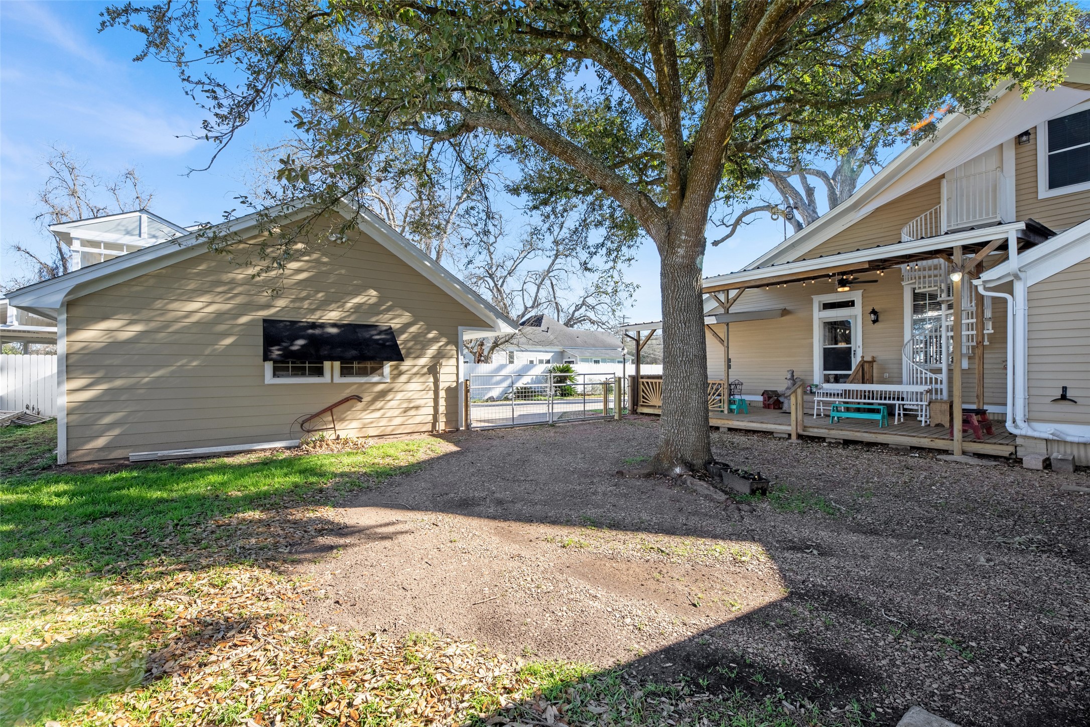 801 North Fulton Street Wharton, TX 77488 - Photo 38 of 43 a backyard of a house with seating space