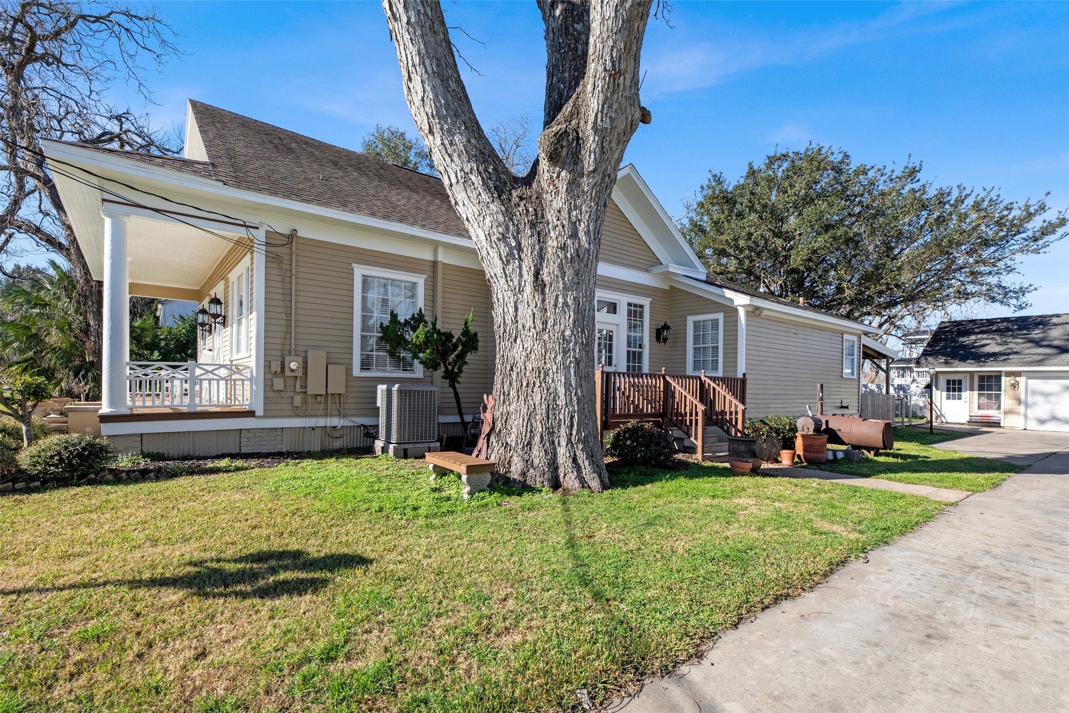 801 North Fulton Street Wharton, TX 77488 - Photo 39 of 43 a view of a house with a yard and large tree