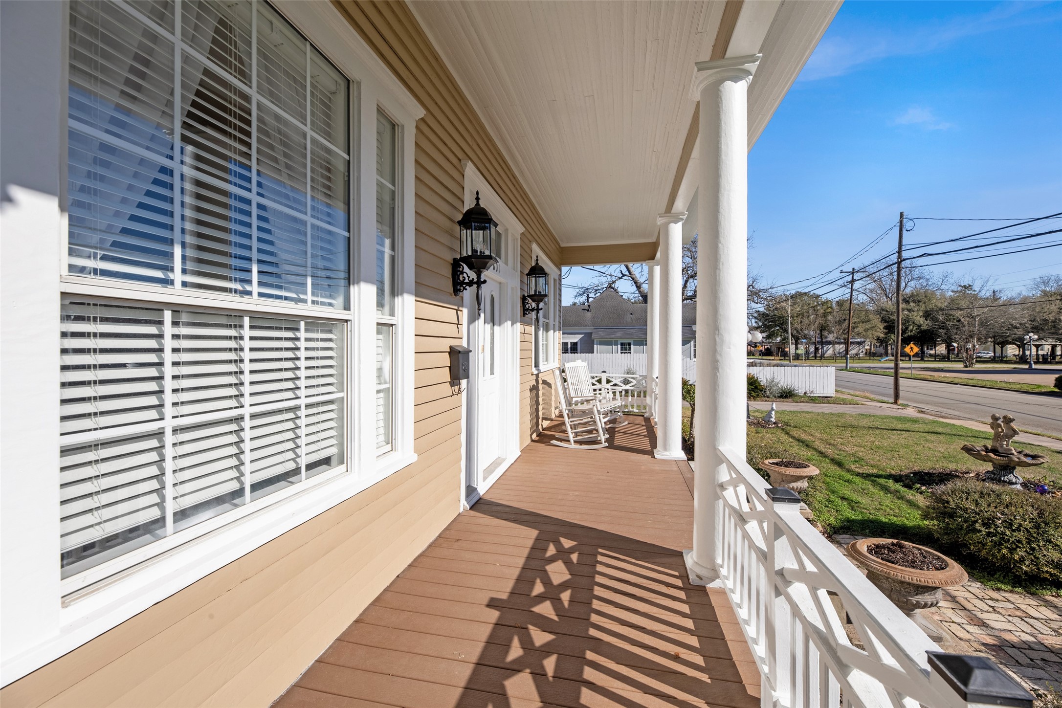 801 North Fulton Street Wharton, TX 77488 - Photo 4 of 43 The front porch sweeps across the front of the home and catches the morning sun.