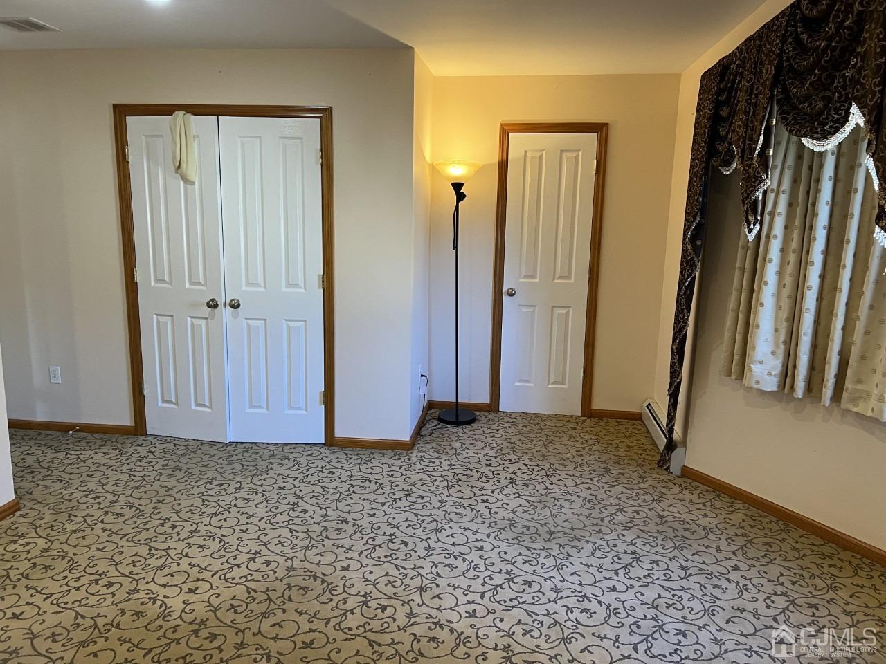 60 Utica Road Edison, NJ 08820 - Photo 29 of 38 an empty room with closet area