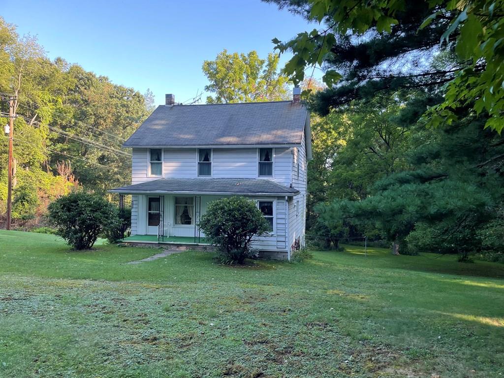983 Lawsonham Road Rimersburg, PA 16248 - Photo 1 of 51 a house view with a garden space